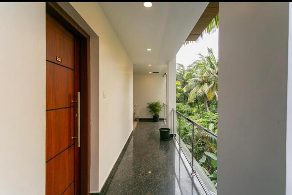 Thenmala Hormuz Inn Kolattupuzha Экстерьер фото